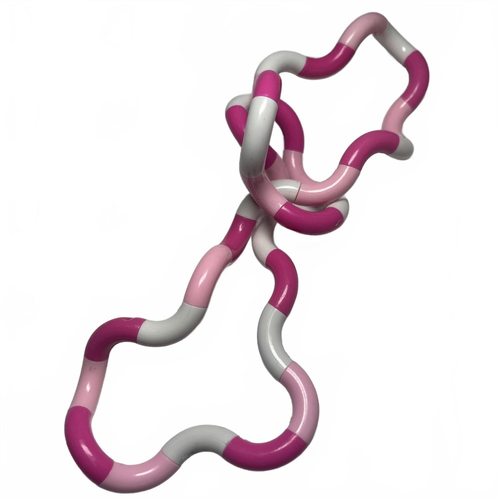 PINK AND WHITE SMIGGLE TWIST AND TURN FIDGET TOY