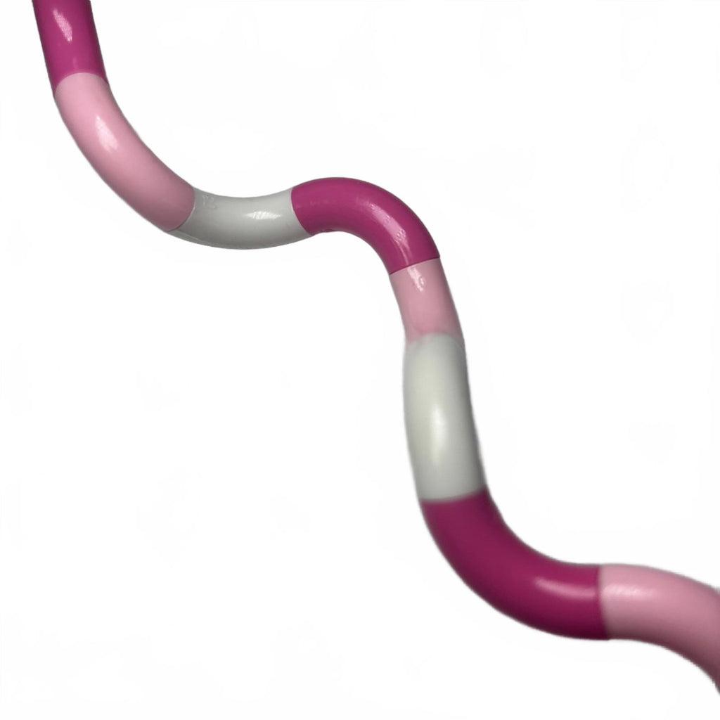 PINK AND WHITE SMIGGLE TWIST AND TURN FIDGET TOY