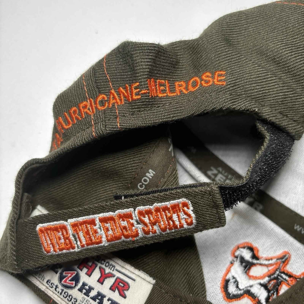 Green and orange Zephyr OTE Cycles cap