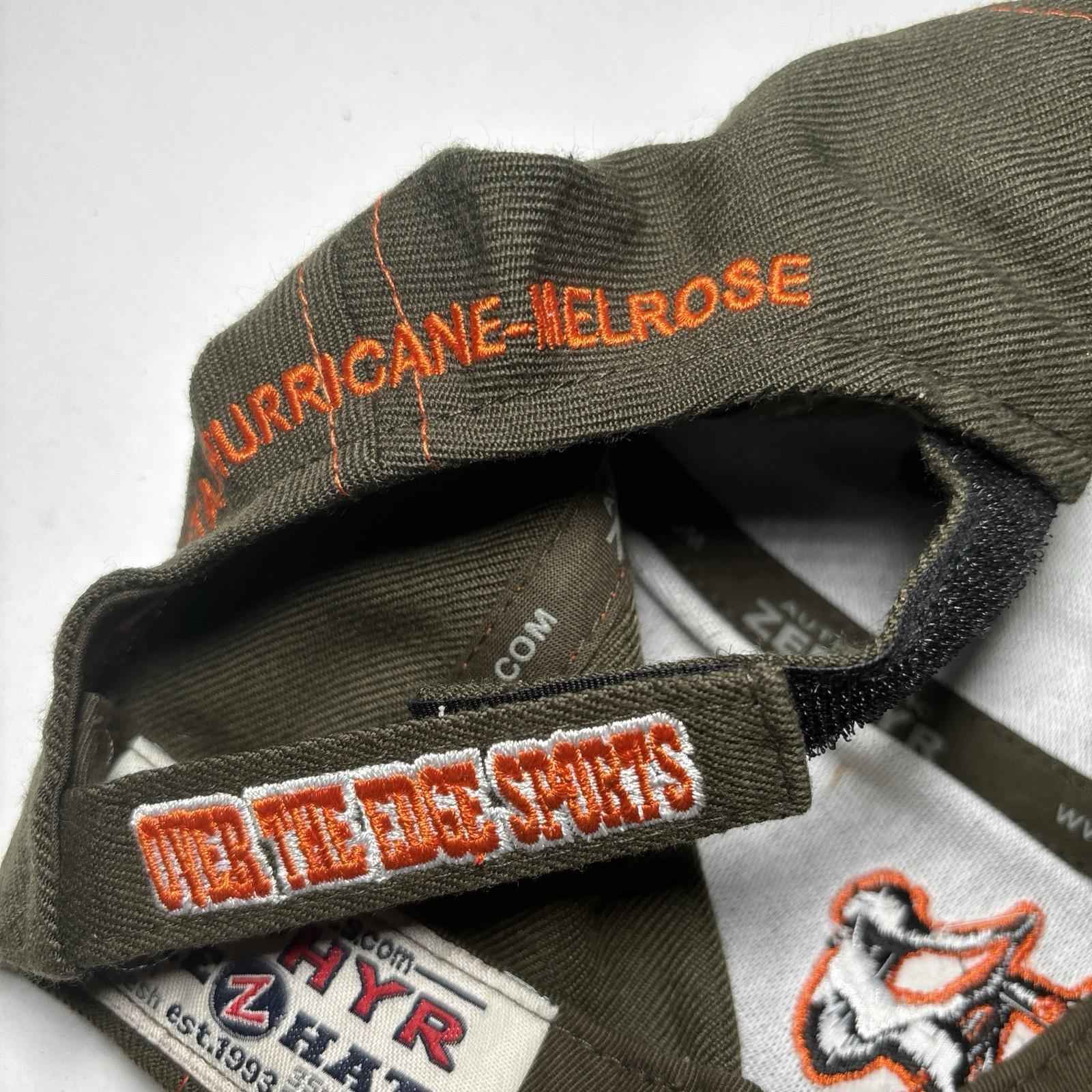 Green and orange Zephyr OTE Cycles cap