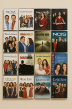 Collection of TV show posters on a wall