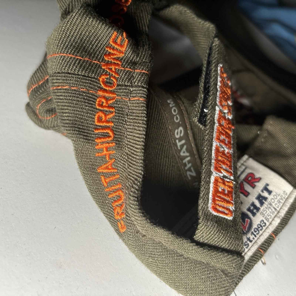 Green and orange Zephyr OTE Cycles cap