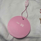 La Sienna Couture Baby Bodysuit with Decorative Pocket