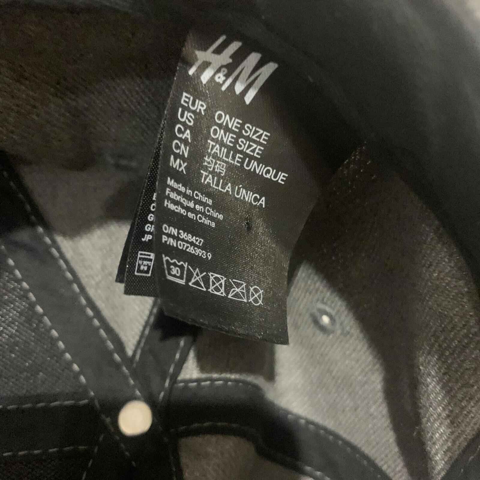 like a Boss cycling cap hat.  Place Sport. Black And Gray Adjustable