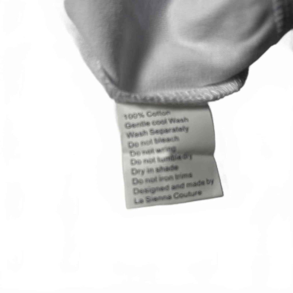 La Sienna Couture Baby Bodysuit with Decorative Pocket